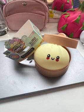 Mystery Dumpling Squishy in Cream with Tan Case